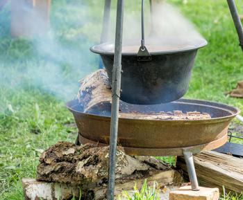 Pot with lunch over open fire place at a medieval festival