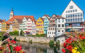 Colorful facades of houses alongside river Neckar in Tübingen, Germany