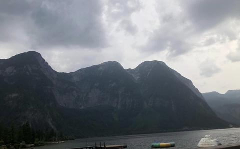 Photo Of Lake view with moutains in the background in Obertraun, Austria