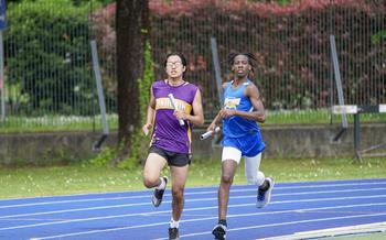 Jose S. and other runner on the track