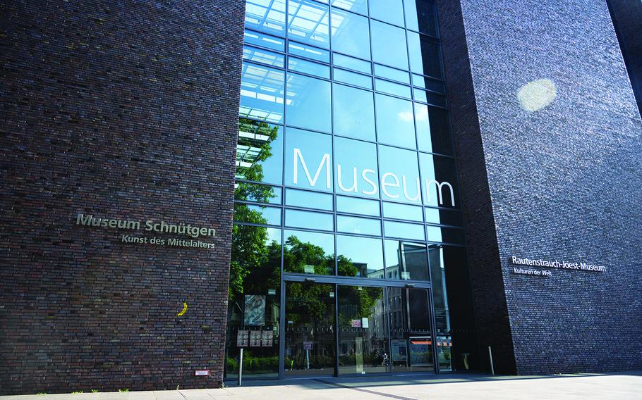 Cologne, Germany - June 29, 2022: Entrance to the new building of the Museum Schnütgen, a museum of (mostly medieval) Christian art, and the Rautenstrauch-Joest-Museum, an ethnographic museum.