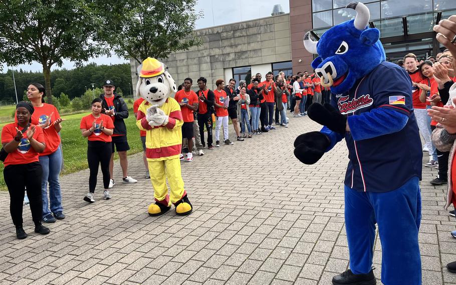 Volunteers and mascots at Spangdahlem Air Base’s 29th annual Special Children’s Day cheer on the children arriving to Spangdahlem AB, Germany, June 20, 2024. 