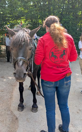Horse and ranch employee