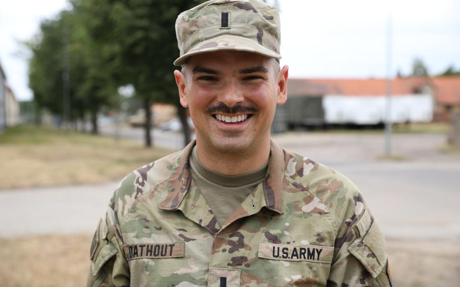 U.S. Army Lt. Patrick Oathout, a platoon leader for Alpha Company, 1st Battalion, 9th Cavalry Regiment, 2nd Armored Brigade Combat Team, 1st Cavarly Division supporting 4th Infantry Division poses for a picture at Bemowo Piskie Training area, Poland, June 14. 