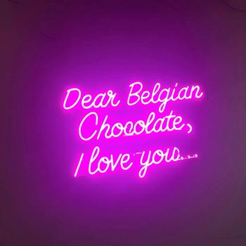 Purple neon sign that reads “ Dear Belgian chocolate I love you...”