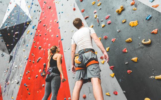 Couple at an indoor rock climbing gym