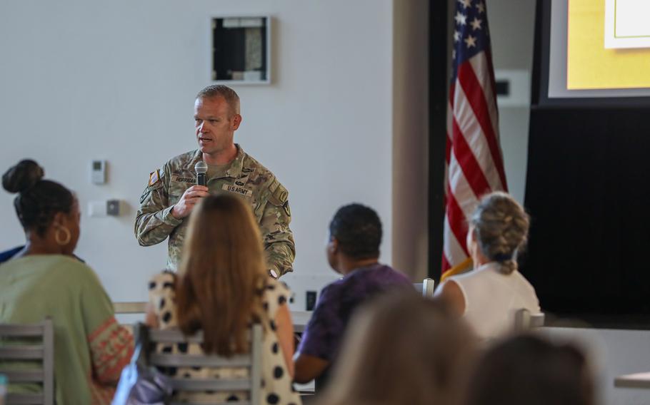 Col. Scott Horrigan, commander of U.S. Army Garrison Italy, speaks to teachers about the instrumental role they play in the community at the new Vicenza High School.