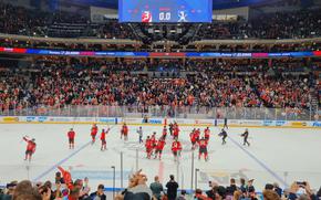 New Jersey Devils huddled in center of ice celebrating win