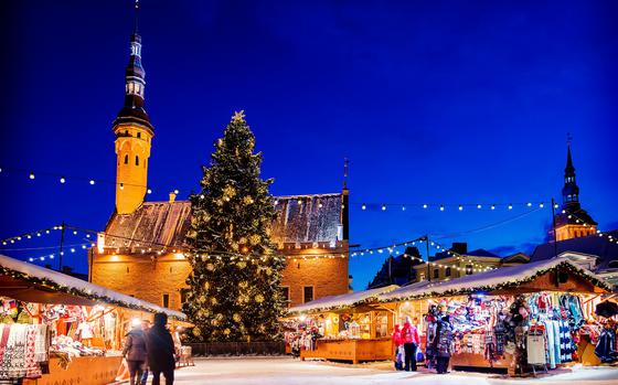 Photo Of Christmas Market in Tallin Market Square lit up at night