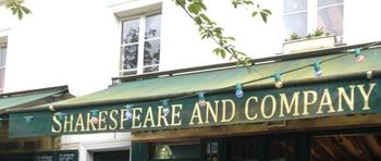 Exterior of Shakespeare and Company with people walking outside