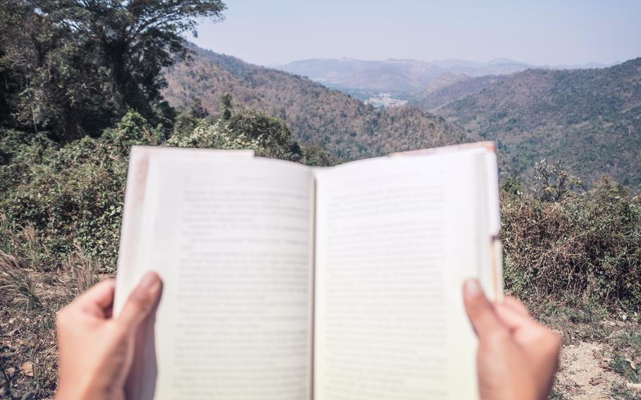 Read books to study travel information. Handle reading