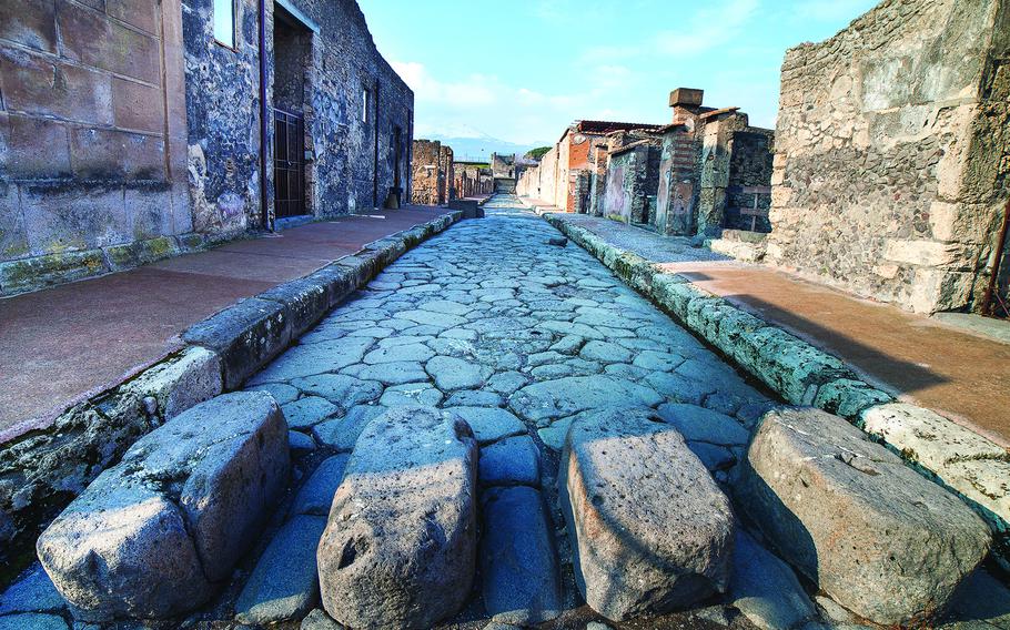 Street in ancient roman city Pompeii, Italy.