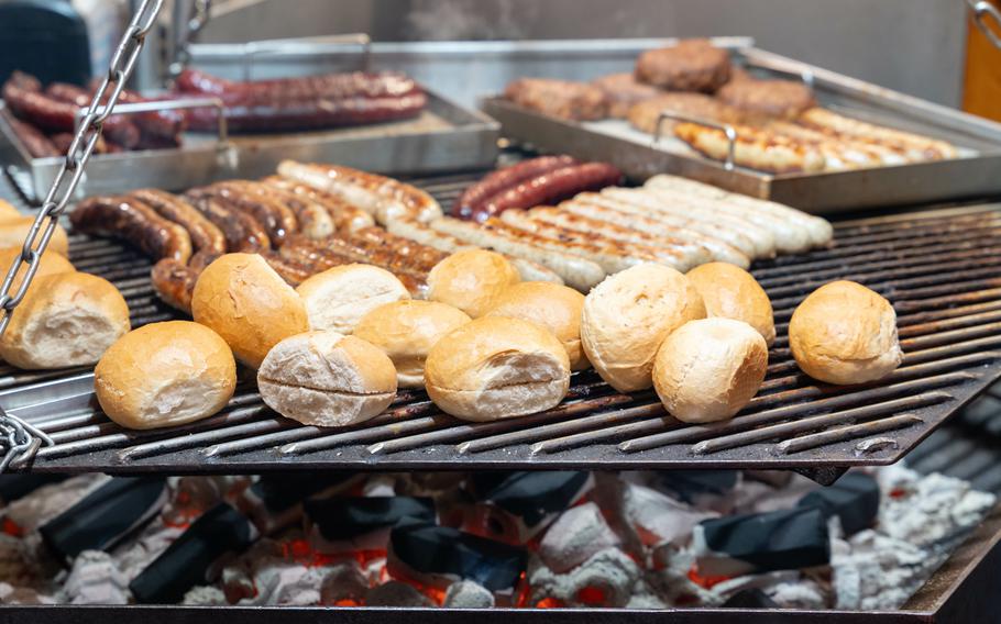 Savor the rich flavors of freshly grilled bratwurst, sizzling over hot coals, paired with crispy bread rolls. A must-try for sausage lovers and food enthusiasts!