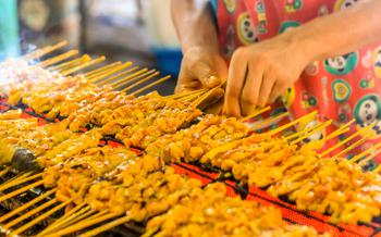 Grilled pork satays on the stove oven Thai style