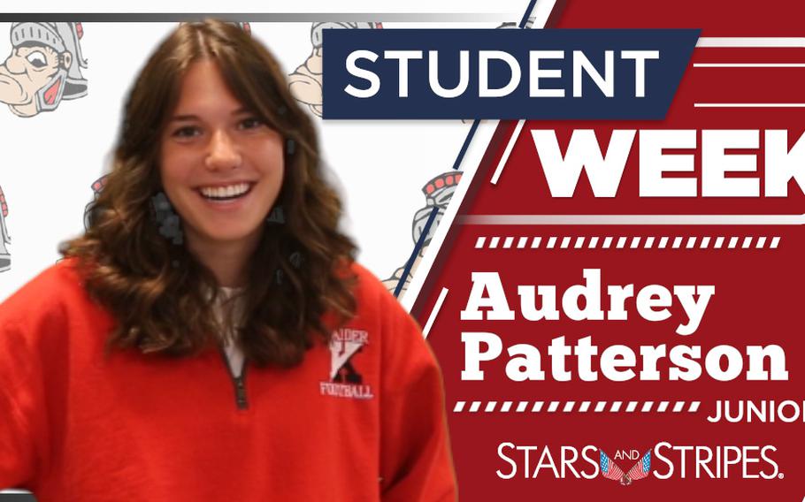 Audrey Patterson, a Kaiserslautern High School junior, excels in academics, leads in Student Council and NHS, and dreams of culinary school in Paris while cherishing her global community in Germany.