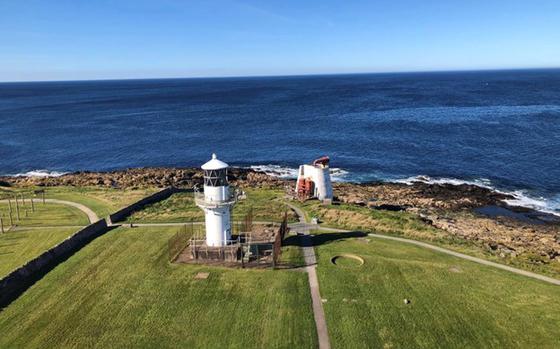 View of old lighthouse and coastline in Fraserburgh