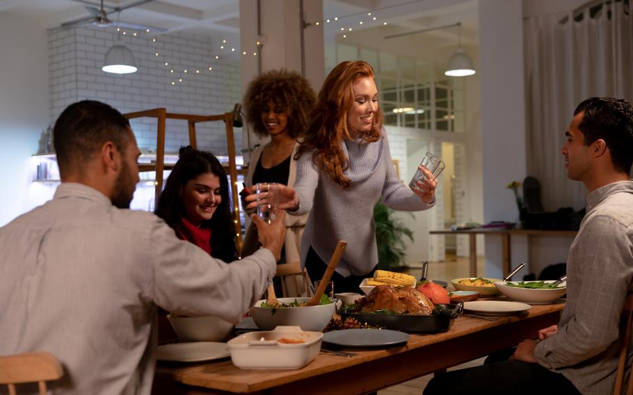 Friends gathered for a Thanksgiving meal