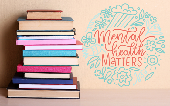 Photo Of Stack of books on the left side on a tan background. Graphic logo with “mental health matters” in red letters with blue floral designs wrapped around the words on the right side of picture.