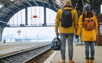 Couple at railway station. 