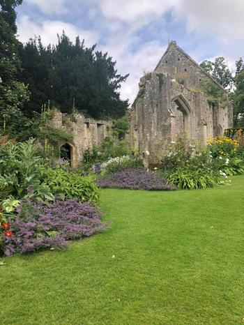 Building ruins with a surrounding garden at Sudeley Castle and Gardens