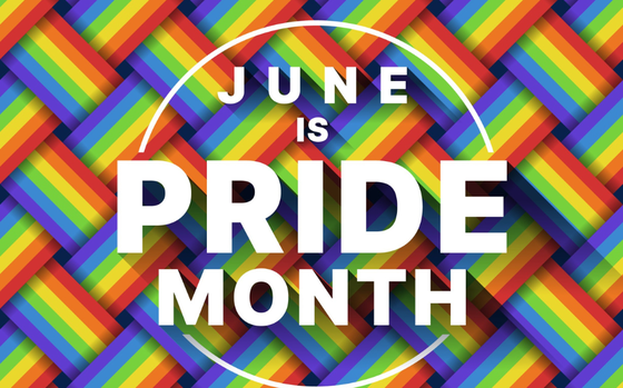 Photo Of Words “June is Pride Month” on a rainbow background