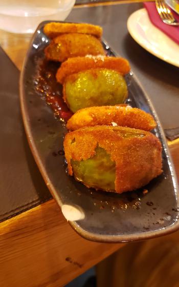 Fried Green Tomatoes with breading flaking off tomatoes