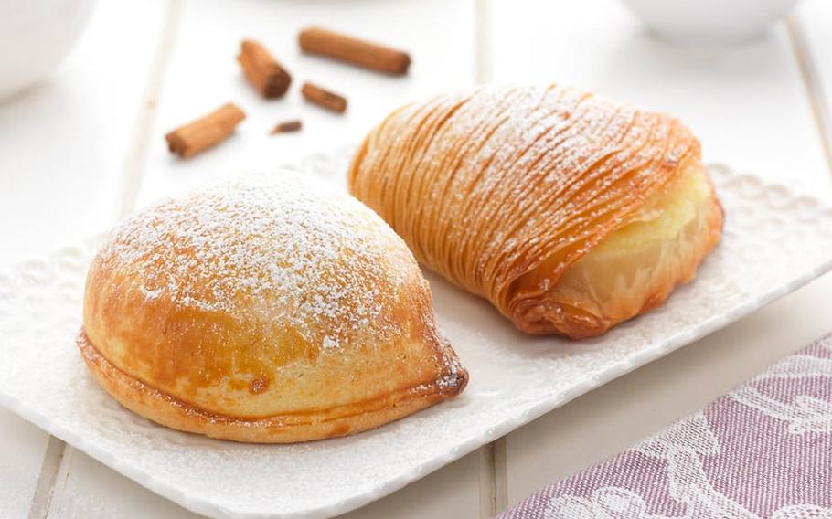 Discover Naples’ finest pastries: the flaky, layered Sfogliatella Riccia and the soft, buttery Sfogliatella Frolla, each filled with a deliciously aromatic ricotta cream for a perfect taste of Neapolitan sweetness.