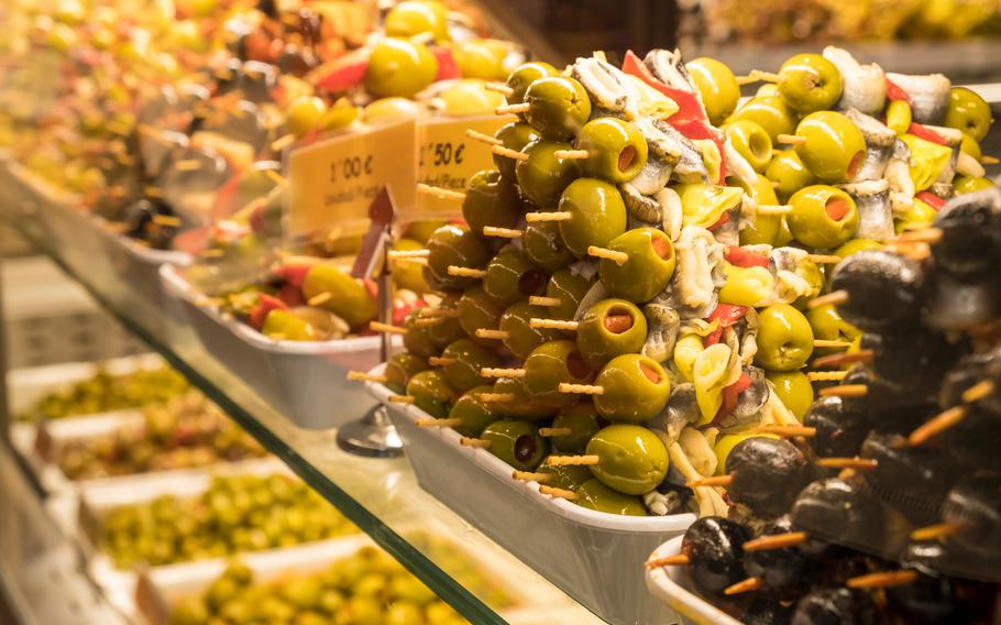 Assorted Olives on Display in Mercado de San Miguel in Madrid Spain 