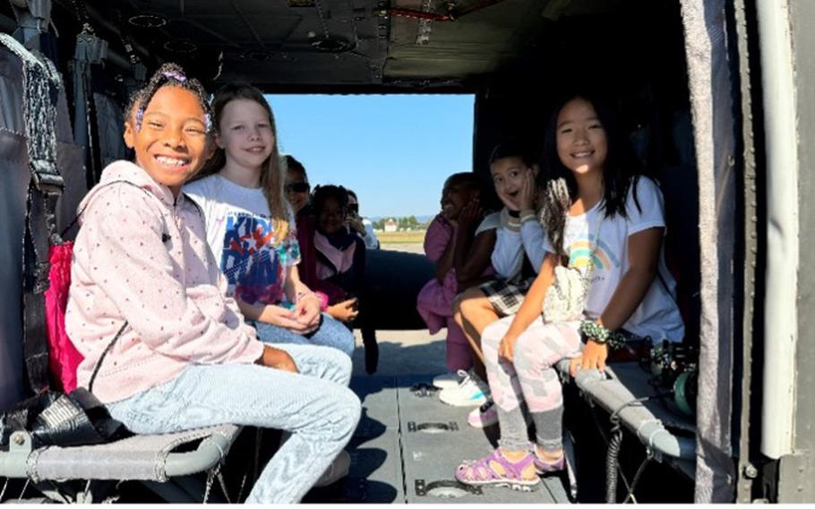 Girls enjoy a helicopter tour at U.S. Army Garrison Wiesbaden.