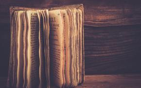 Vintage book on a wooden background 