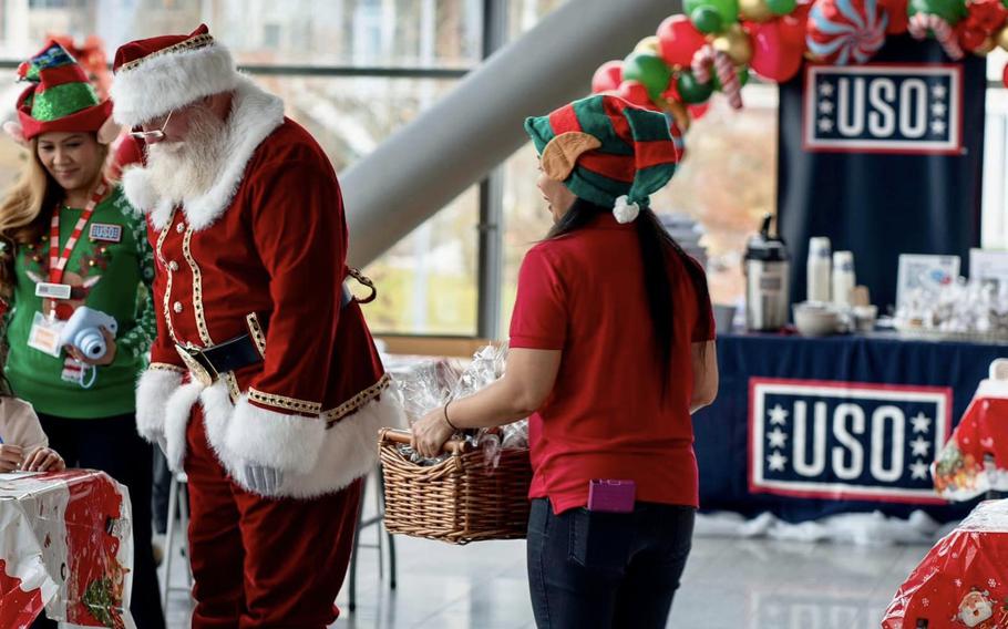 Santa and his elves at the USO on Ramstein AB, Germany