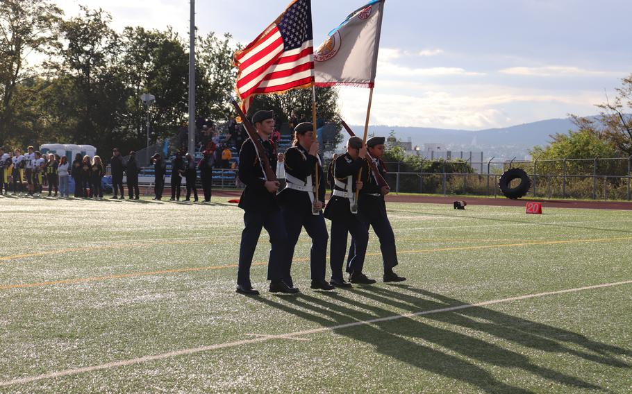 C/1LT Catherine Mellon commands the Wiesbaden homecoming football game color guard.