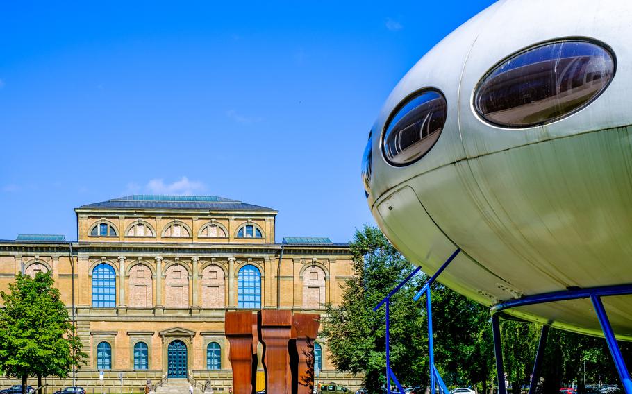 Munich’s Pinakothek in the background of the Future House display