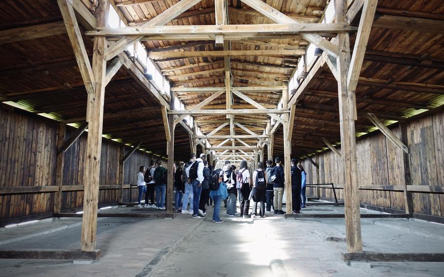 These reconstructed barracks at Auschwitz stand as a haunting reminder of the inhumane conditions endured by prisoners during the Holocaust. Their silent walls bear witness to unimaginable suffering, ensuring that history is never forgotten.