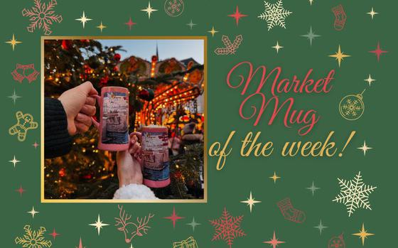 a picture of two people holding hot pink Christmas market mugs against the backdrop of a sparkly evergreen and market stalls