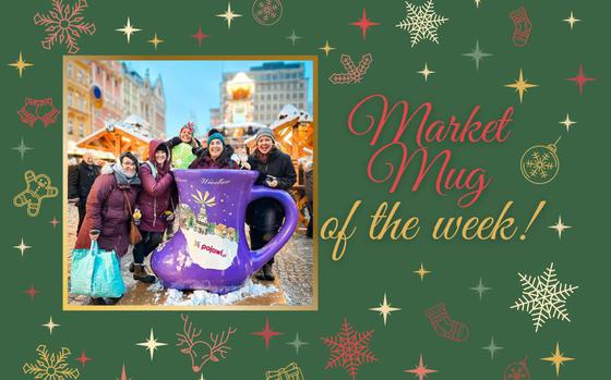 A group of women circled around a giant, bright purple boot-shaped mug a the Christmas market. 