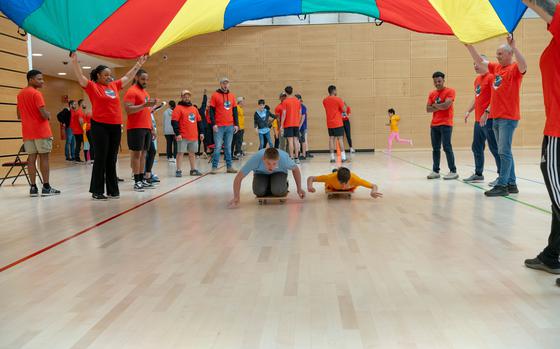 Participants in Spangdahlem Air Base’s 29th annual Special Children’s Day play roller board at Spangdahlem AB, Germany, June 20, 2024. Over 200 volunteers from across the base helped to put on the event. (U.S. Air Force photo by Senior Airman Imani West)