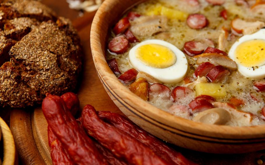 Traditional Zurek with sausage and egg, white borscht, polish homemade Easter soup