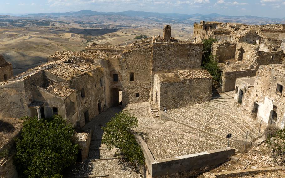 Aerial view of the historic center of Craco, a ghost town in province of Matera, Basilicata, Italy. The historic center was depopulated due to a landslide and has become a tourist destination.