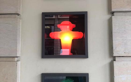 Three Ampelmenn lamps stacked vertically | Green on top, red in middle, green on bottom