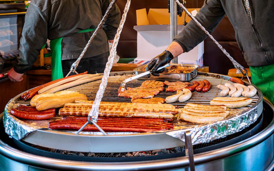 Summer festival food on grill at the Dippemess in Frankfurt