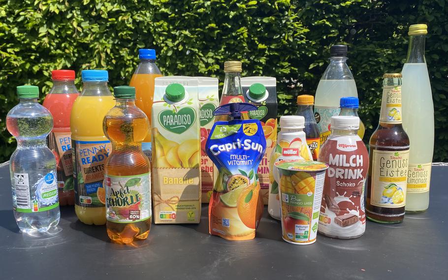 a table with many store bought packaged beverages