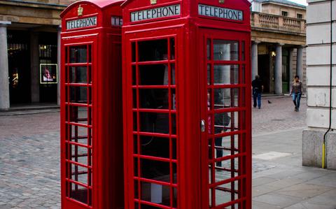 Photo Of Two red phonebooths in London