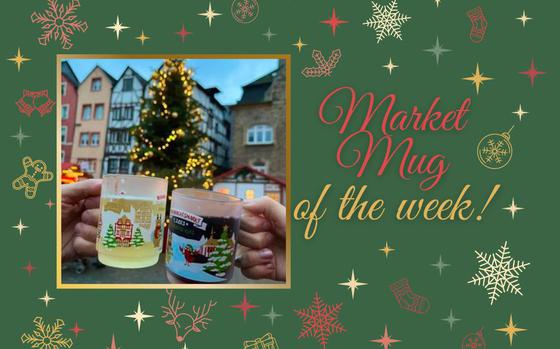 Two hands cheers two frosted market mugs against the backdrop of a twinkling Christmas tree and half-timbered houses