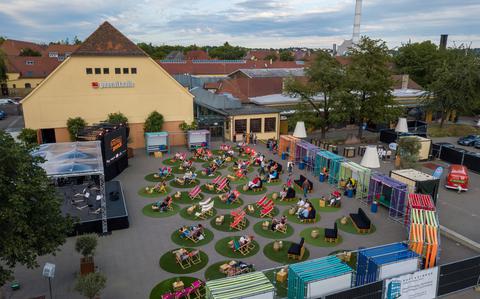 Photo Of Picture of people enjoying an outdoor concert in lawnchairs 