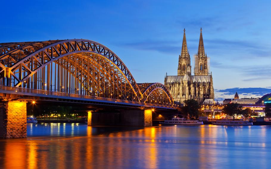 night view of Cologne Cathedral and Hohenzollern Bridge, Cologne, Germany