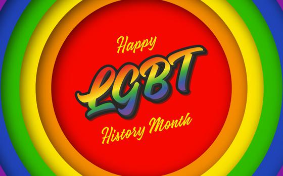 Photo Of Rainbow circles with words in center that read “Happy LGBT History Month”