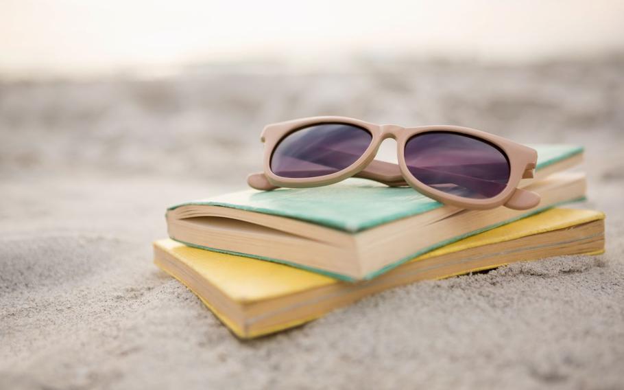 Sunglasses on books