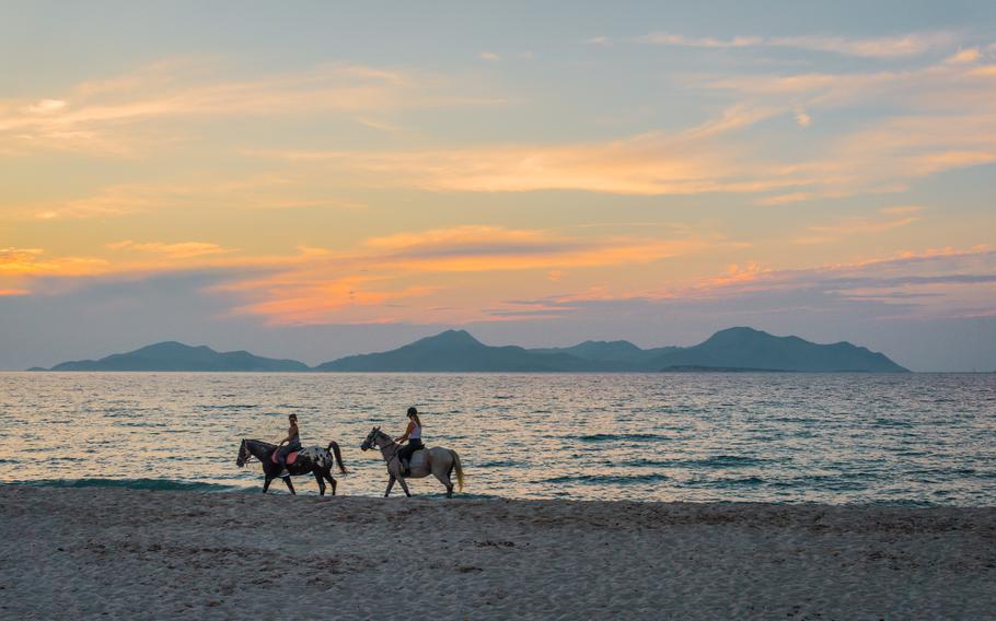 Horse riding on Marmari and Tigaki Beach near Salt Lake during sunset. Kos islands, Greece