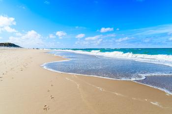 Beautiful sea waves on Kampen beach on sunny summer day, Sylt Island, Germany